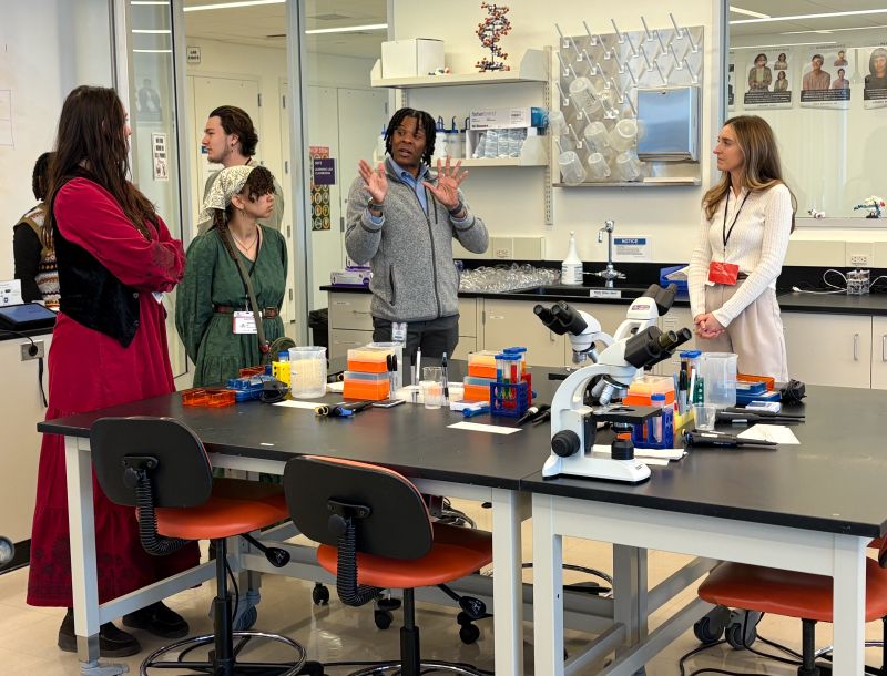 Vertex employee showing Boston Private Industry Council Career Specialists their STEM Learning Lab