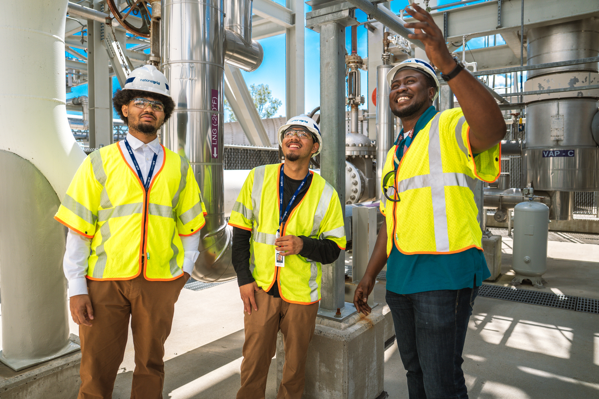 National Grid interns Tony Depina and Victor Galindo with Chima Anidobe, Principal Workforce Development Manager. 