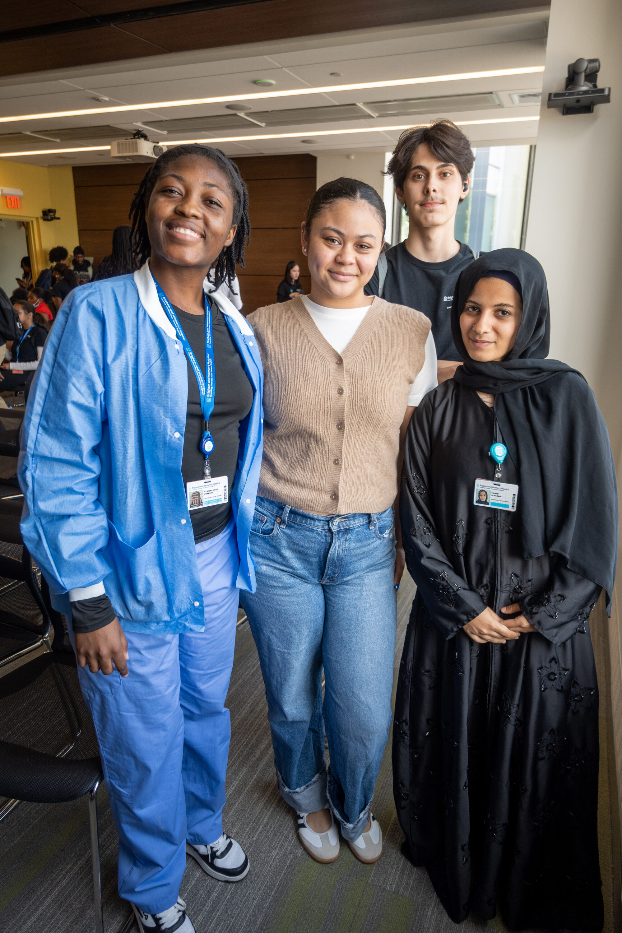 Brighton High School students pose with their Career Specialist, Nayelis Hernandez (center left), at the Brigham and Women’s Hospital internship closing ceremony.